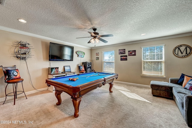 rec room with ornamental molding, billiards, ceiling fan, and light colored carpet