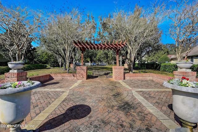 view of property's community featuring a patio