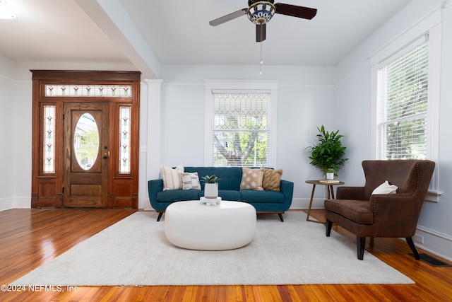 entrance foyer featuring ceiling fan and light hardwood / wood-style floors