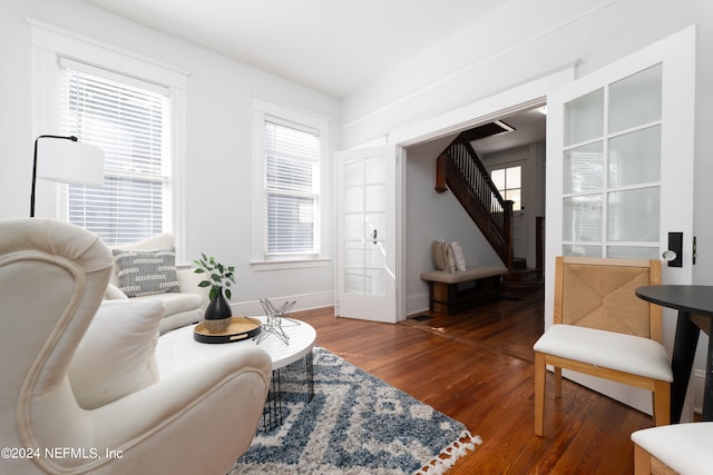 living room with dark hardwood / wood-style floors