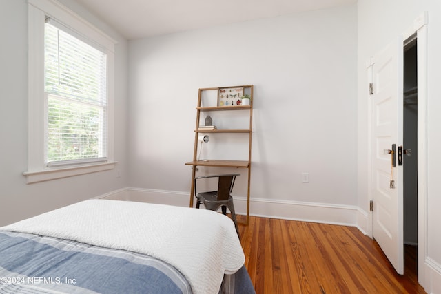 bedroom featuring dark hardwood / wood-style floors