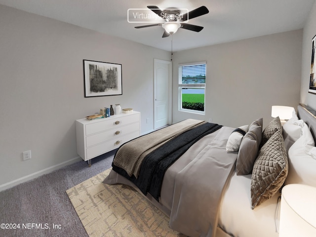 bedroom featuring light carpet and ceiling fan