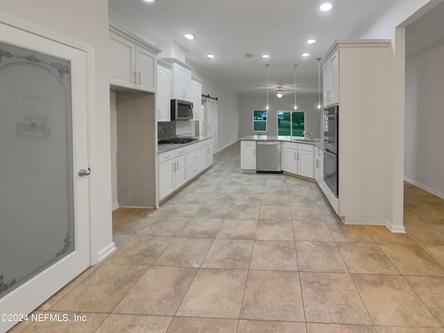 kitchen featuring light tile floors, ceiling fan, kitchen peninsula, appliances with stainless steel finishes, and backsplash