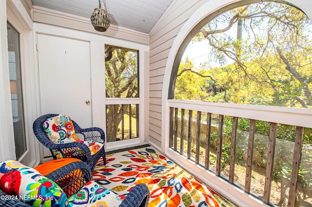 exterior space featuring lofted ceiling