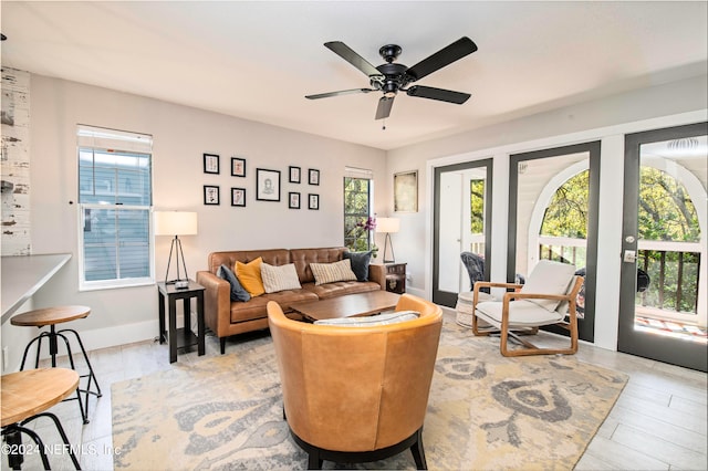 living room featuring ceiling fan