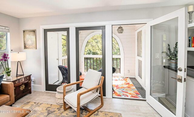 living area featuring french doors