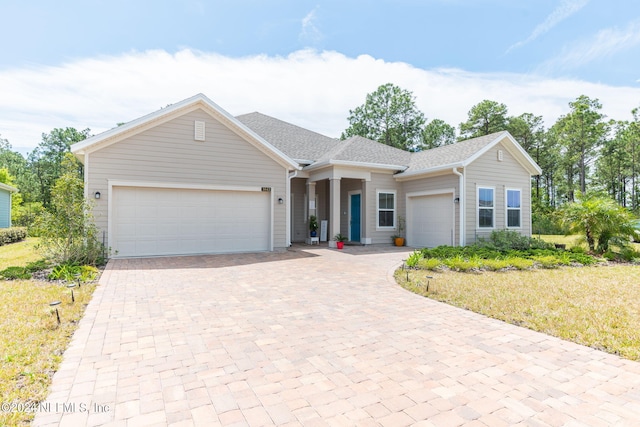 view of front of house with a garage