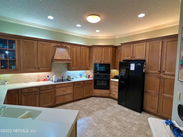 kitchen featuring light tile floors, black appliances, crown molding, backsplash, and premium range hood