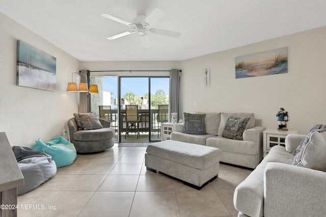 living room with ceiling fan and light tile floors