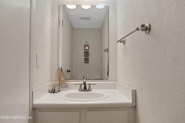 bathroom with oversized vanity