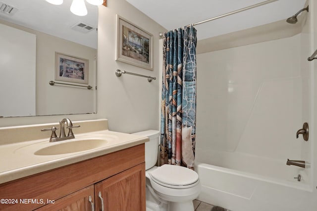 full bathroom featuring shower / tub combo, tile flooring, toilet, and vanity