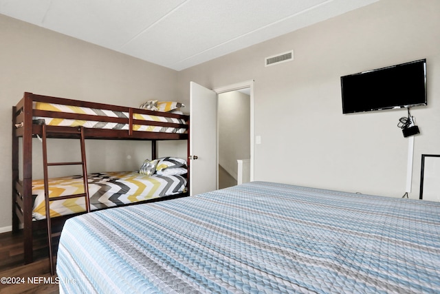 bedroom featuring wood-type flooring