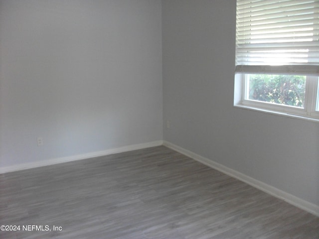 spare room featuring hardwood / wood-style flooring