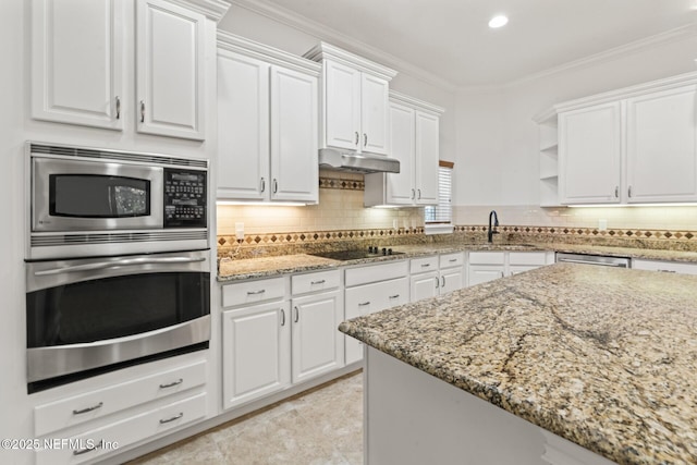 kitchen with a sink, stainless steel appliances, under cabinet range hood, white cabinetry, and crown molding