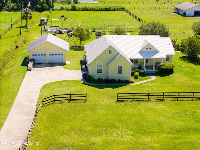 birds eye view of property featuring a rural view