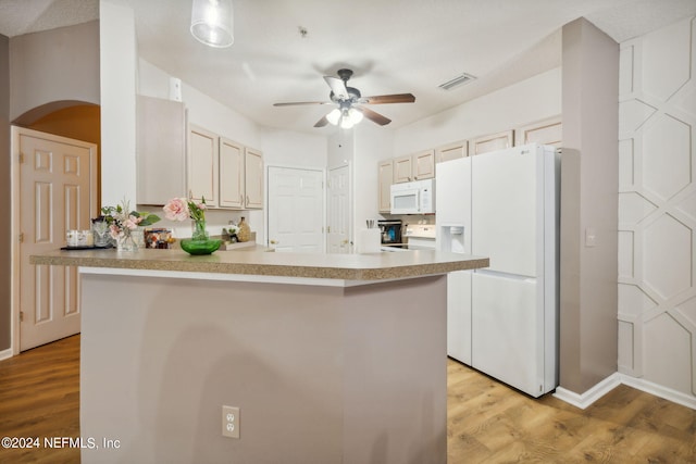 kitchen featuring ceiling fan, hanging light fixtures, white appliances, and light wood-type flooring