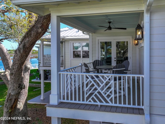 property entrance with ceiling fan