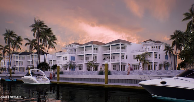 view of outdoor building at dusk