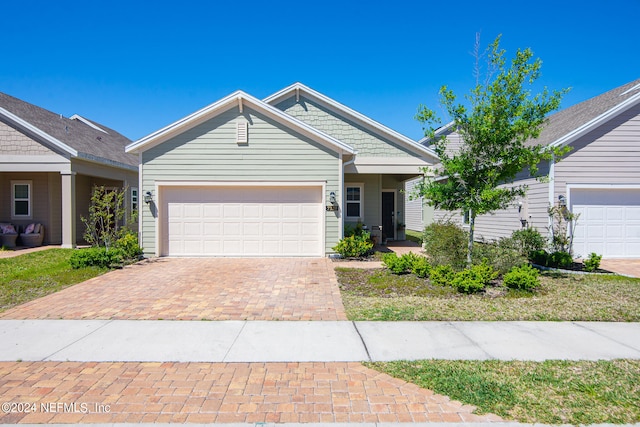 view of front of property featuring a garage