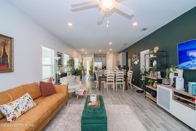 living room featuring ceiling fan