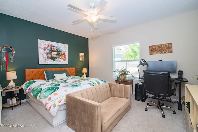 bedroom featuring ceiling fan and light colored carpet