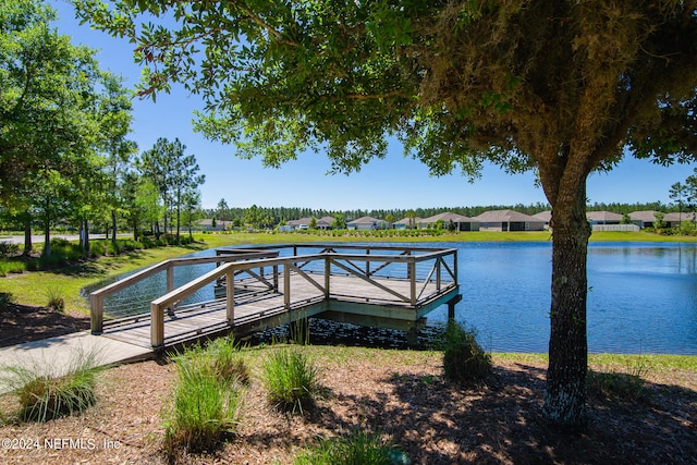 view of dock with a water view