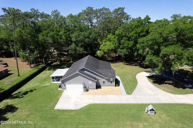 view of property's community featuring a yard