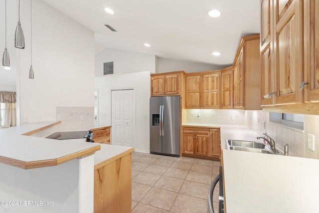 kitchen with light tile floors, kitchen peninsula, tasteful backsplash, stainless steel refrigerator with ice dispenser, and sink