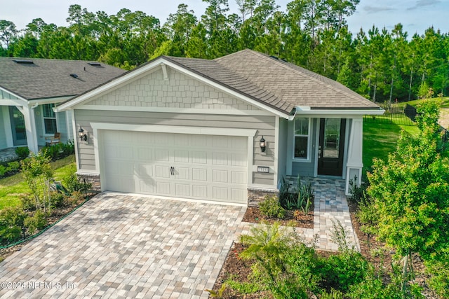 view of front of property with a garage