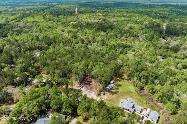 bird's eye view with a forest view