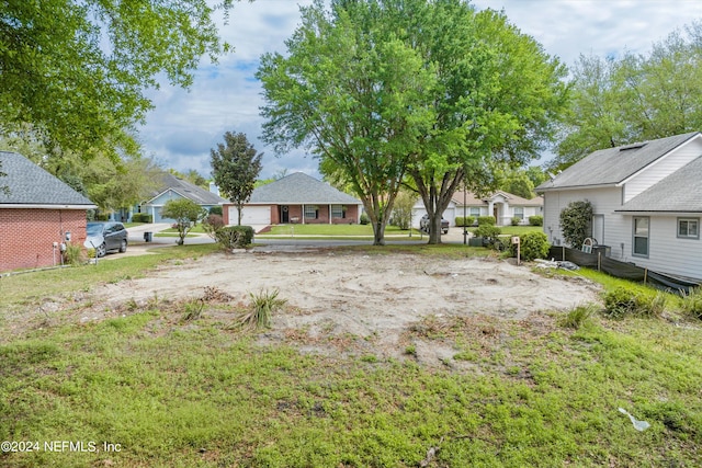 view of yard featuring a garage