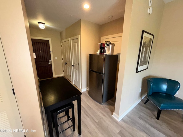 interior space with light hardwood / wood-style flooring