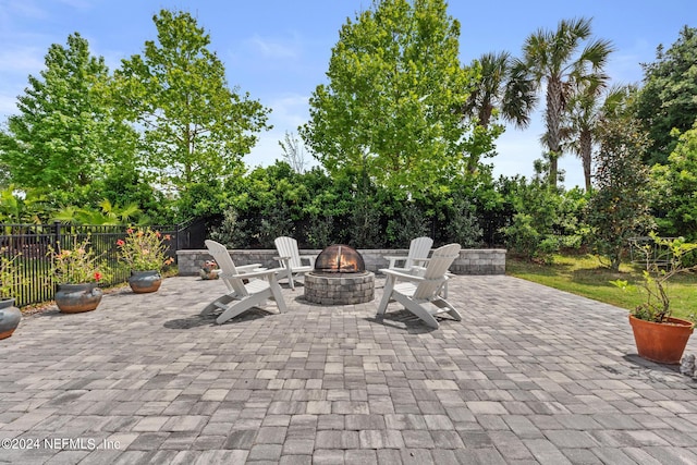 view of patio / terrace featuring a fire pit