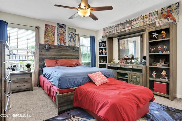 bedroom featuring carpet floors and ceiling fan