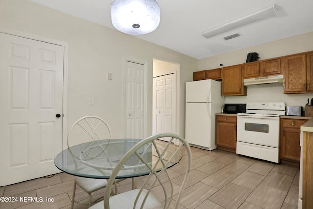 kitchen featuring white appliances