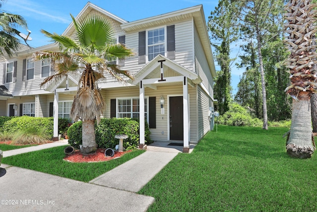 view of front of home featuring a front lawn