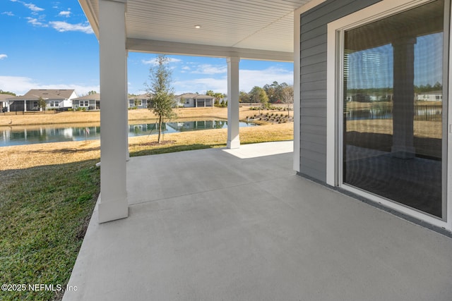 view of patio / terrace with a water view