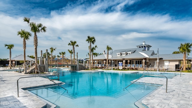 view of pool featuring a patio