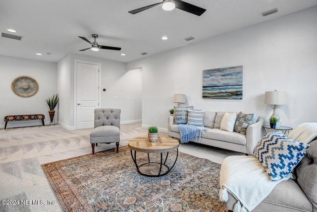 living room with carpet and ceiling fan