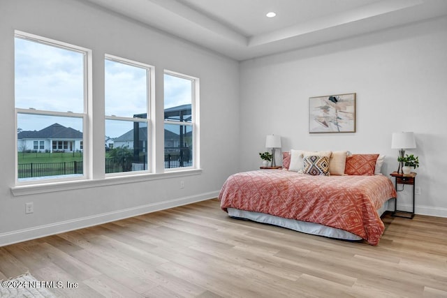 bedroom with light wood-type flooring