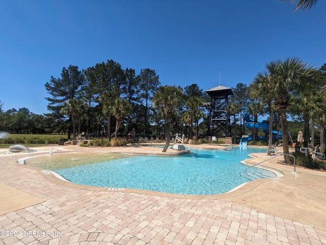 community pool with a patio