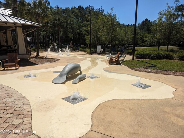 surrounding community featuring a patio