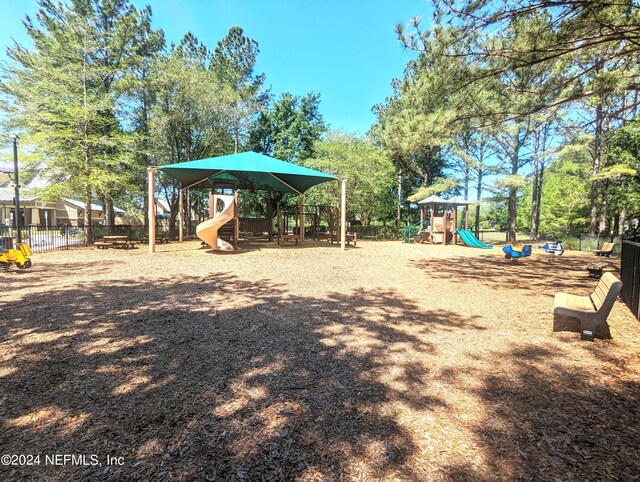 community play area featuring fence