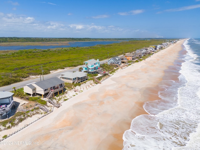 aerial view featuring a beach view and a water view