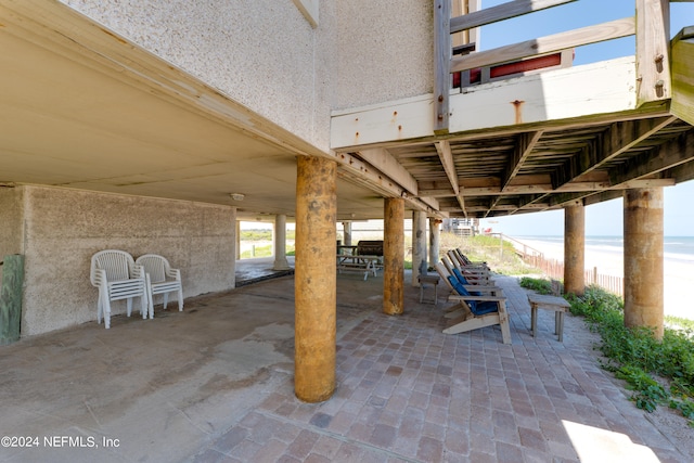 view of patio featuring a water view