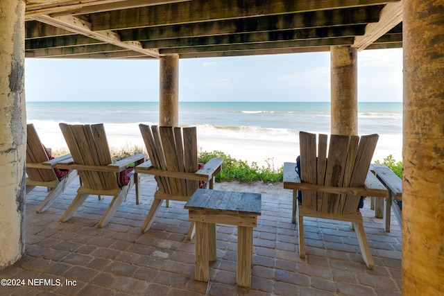 view of terrace featuring a water view