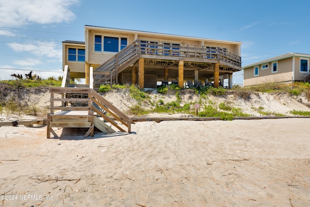 rear view of house with a deck