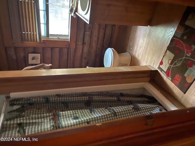 view of sauna / steam room featuring wood walls