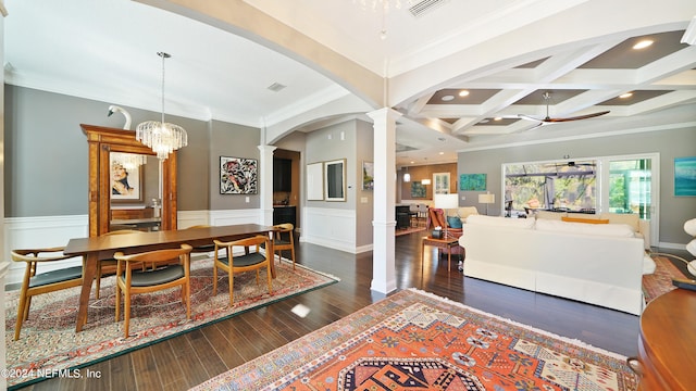 dining room featuring ceiling fan with notable chandelier, dark wood-type flooring, coffered ceiling, beamed ceiling, and ornamental molding