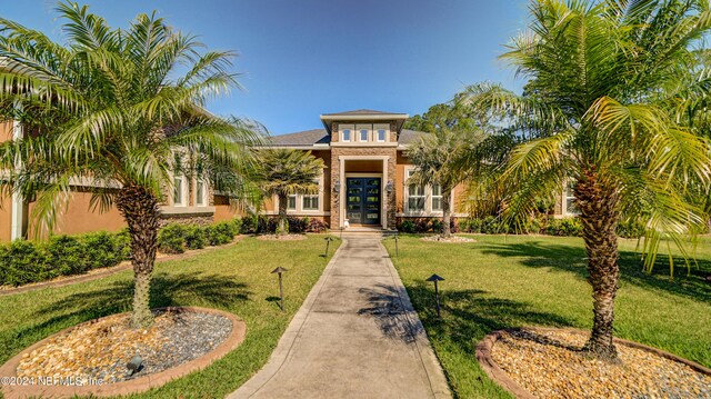 view of front of house with a front yard